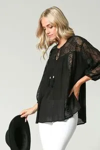 Flowy black tassel tie top