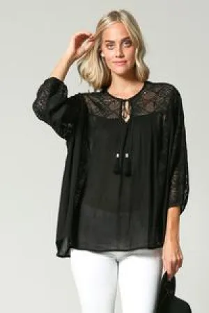 Flowy black tassel tie top